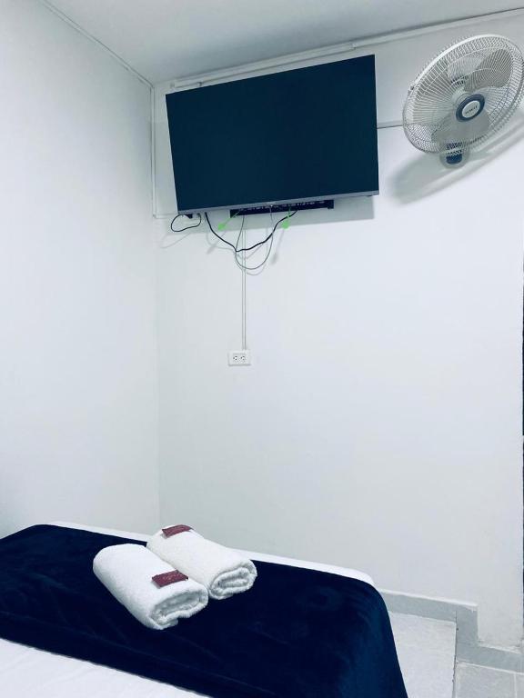 TV a/nebo společenská místnost v ubytování Hotel San Juan 70 Express Medellin