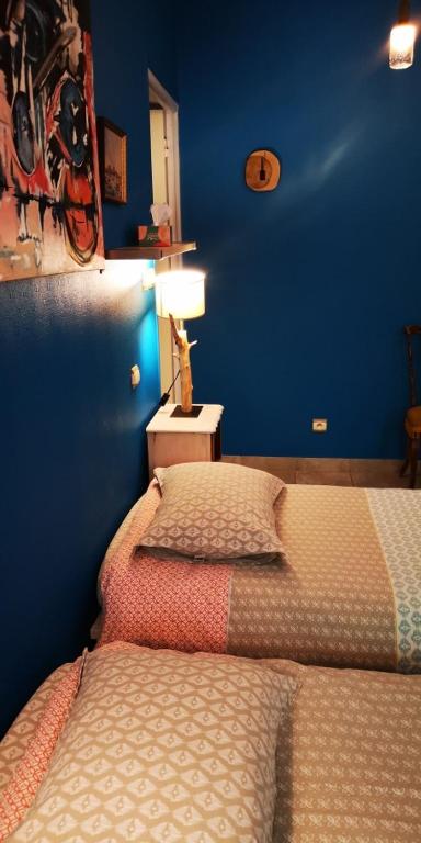 Postel nebo postele na pokoji v ubytování chambre condamine spa