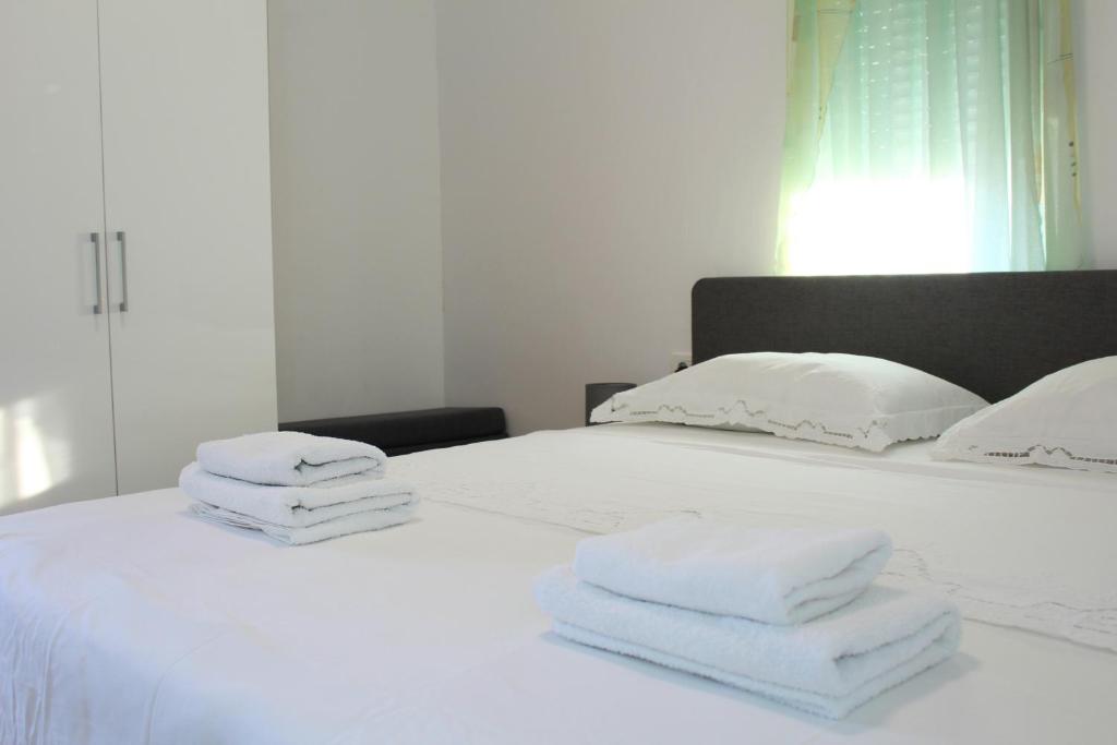 Posteľ alebo postele v izbe v ubytovaní Luxury apartment Maestral - private pool