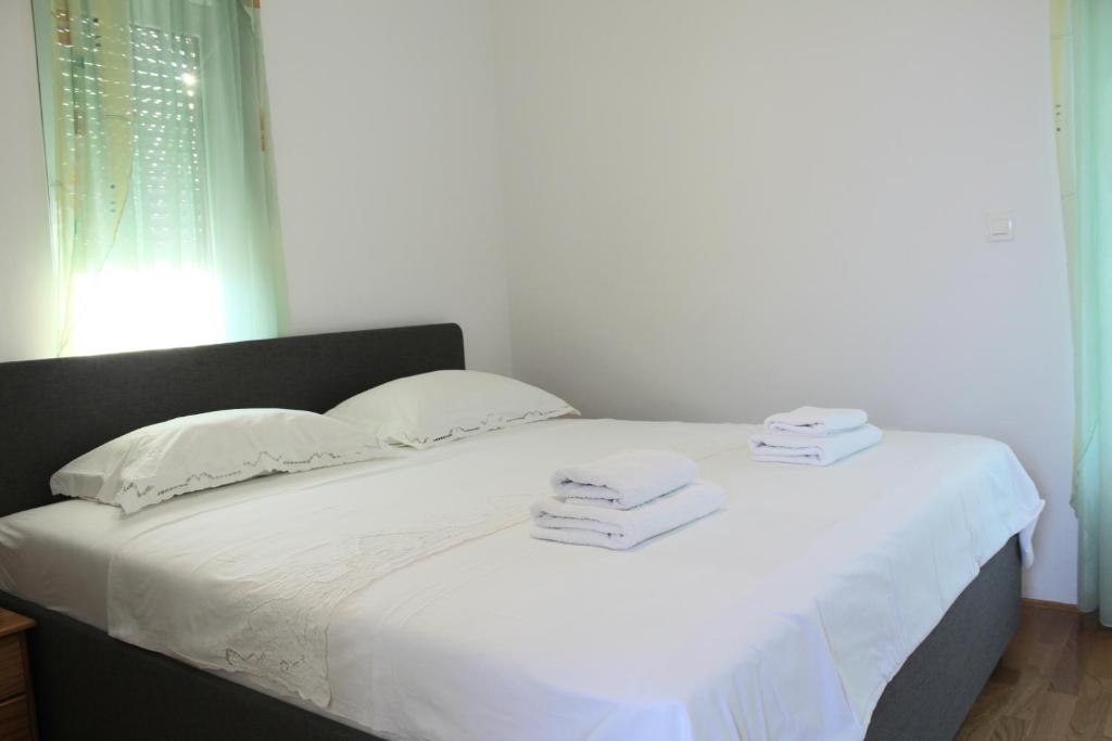 Posteľ alebo postele v izbe v ubytovaní Luxury apartment Maestral - private pool
