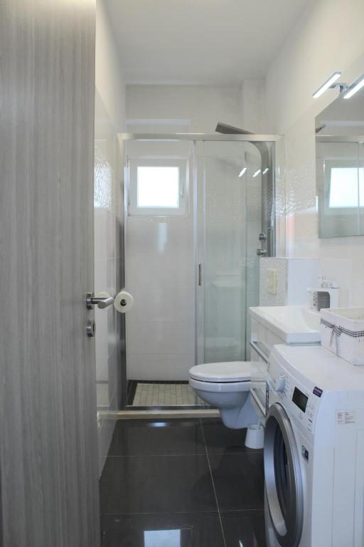 Kúpeľňa v ubytovaní Luxury apartment Maestral - private pool