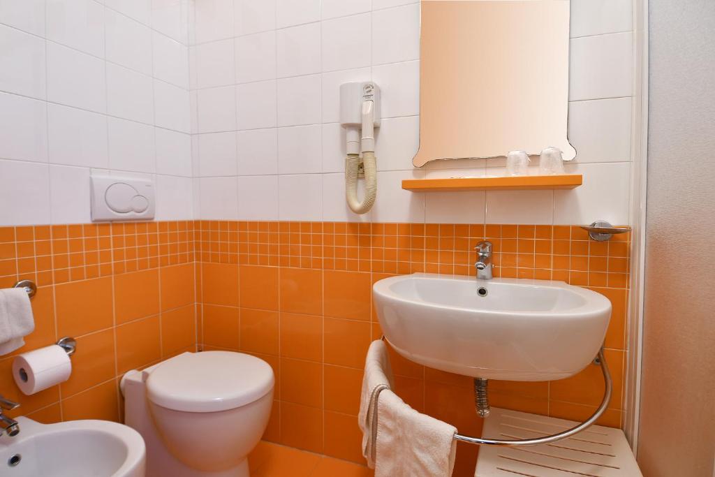 Koupelna v ubytování Hotel Innocenti