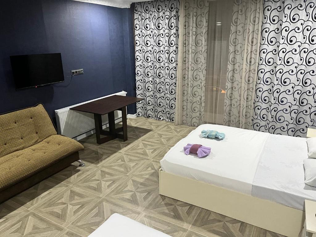Llit o llits en una habitació de LeFlore Hotel