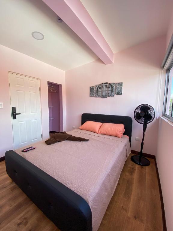 Postel nebo postele na pokoji v ubytování Casa Pandora Hostel Women Only