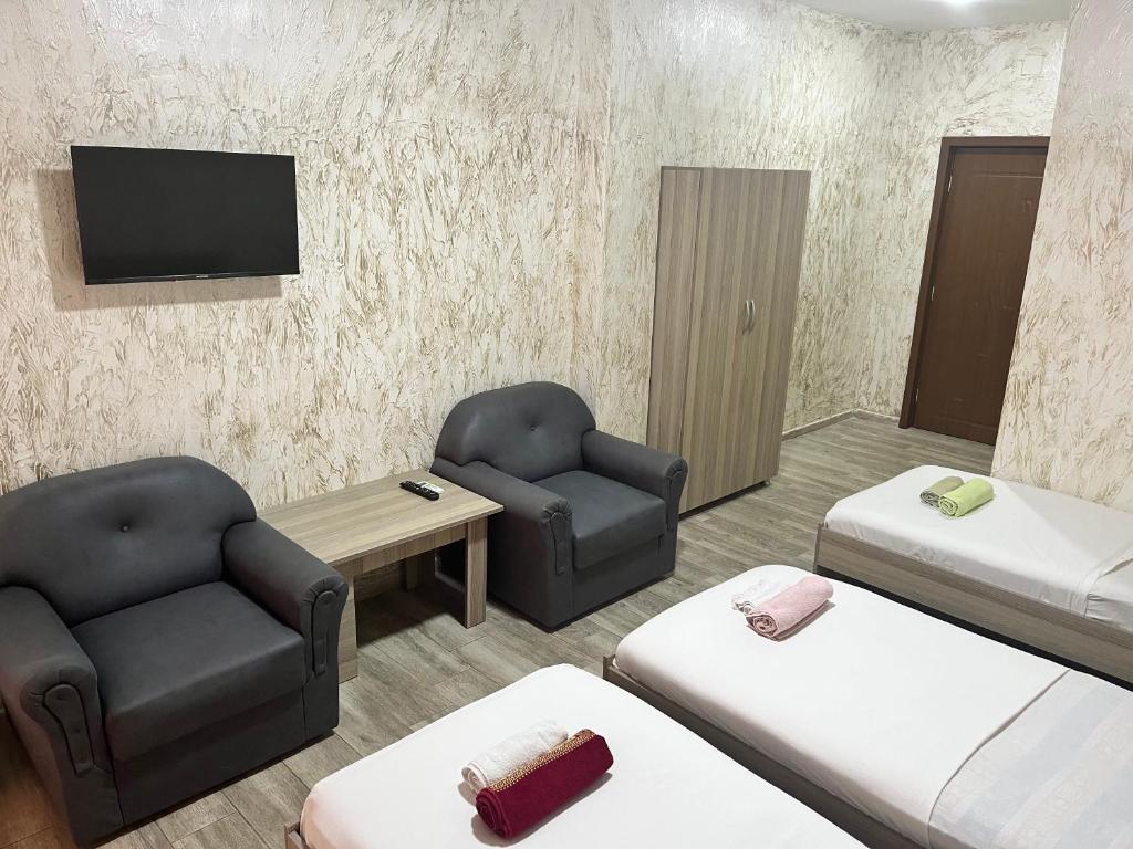 Llit o llits en una habitació de LeFlore Hotel