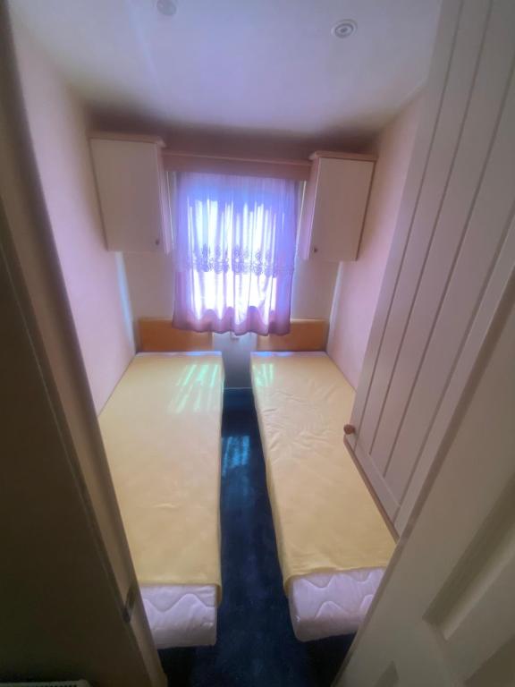 Postel nebo postele na pokoji v ubytování HorgászLak
