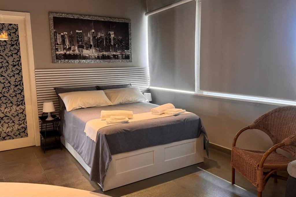 Ένα ή περισσότερα κρεβάτια σε δωμάτιο στο Casa Vacanze Luxor House