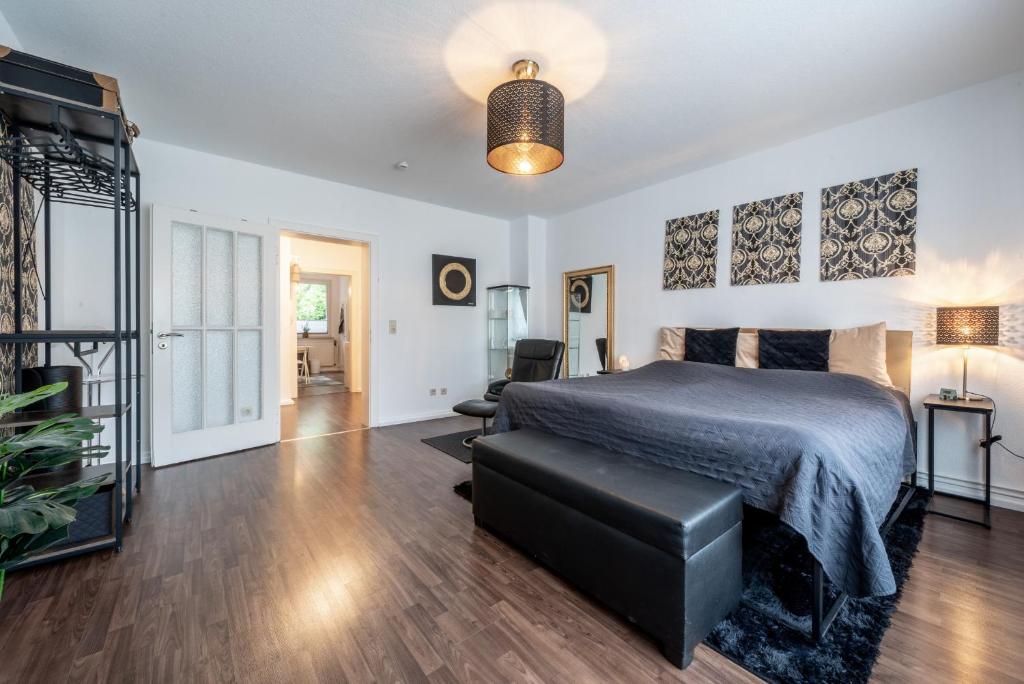 Ένα ή περισσότερα κρεβάτια σε δωμάτιο στο City Suite Hannover
