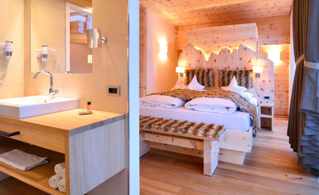 Postel nebo postele na pokoji v ubytování Chalet Elisabeth dolomites alpin & charme