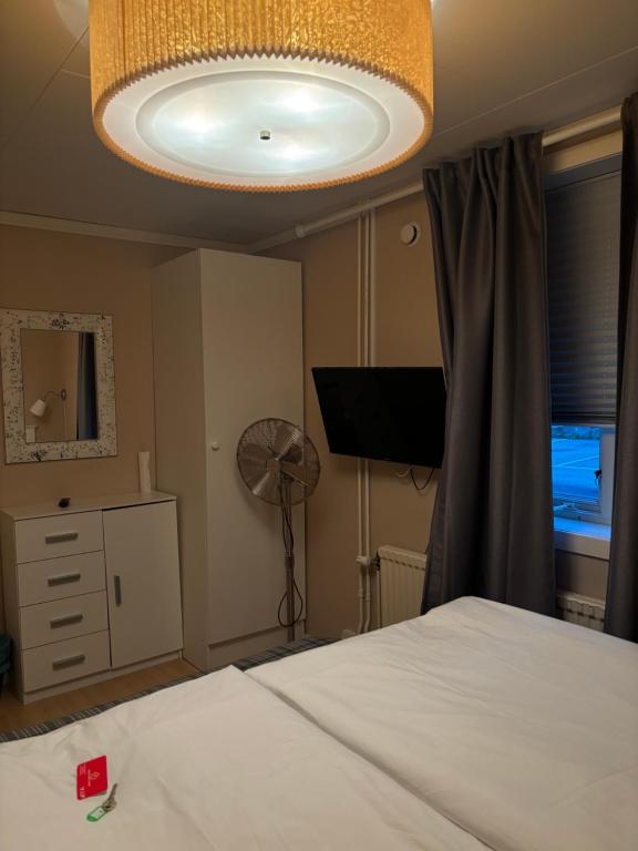 Postel nebo postele na pokoji v ubytování Rum mitt stan