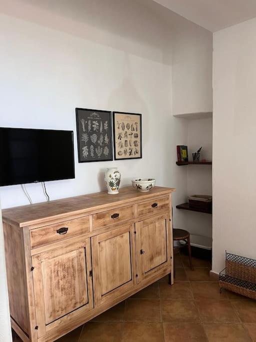 TV a/nebo společenská místnost v ubytování Casa Marisella