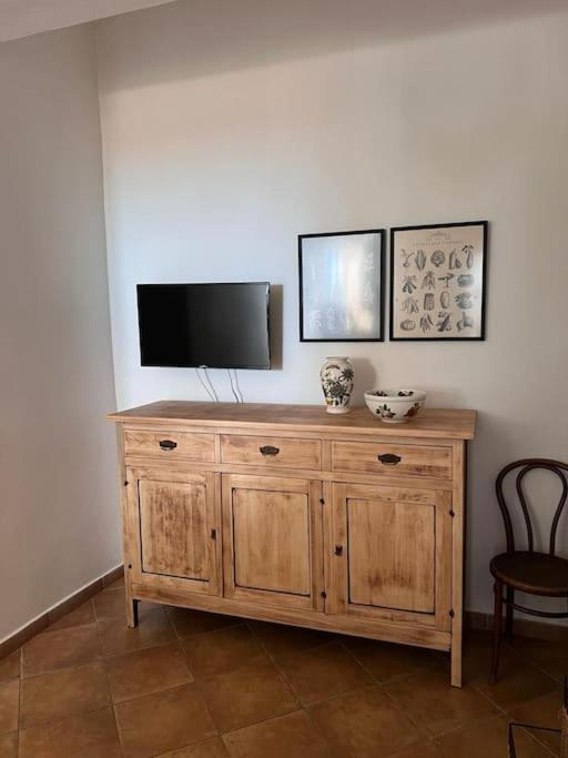TV a/nebo společenská místnost v ubytování Casa Marisella