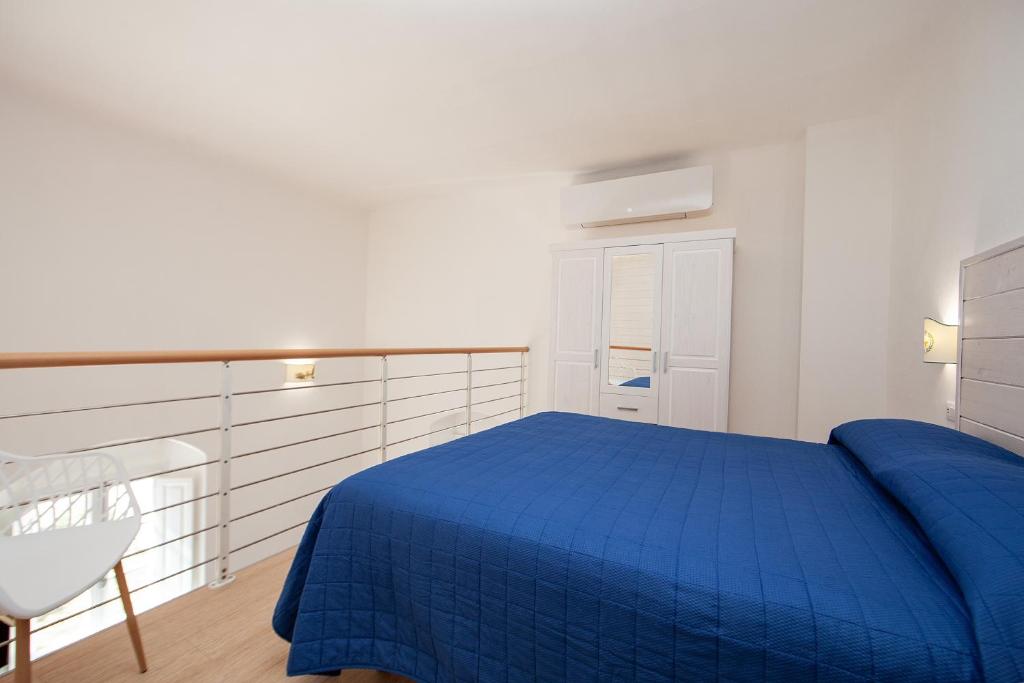 Una cama o camas en una habitación de Villa le Api