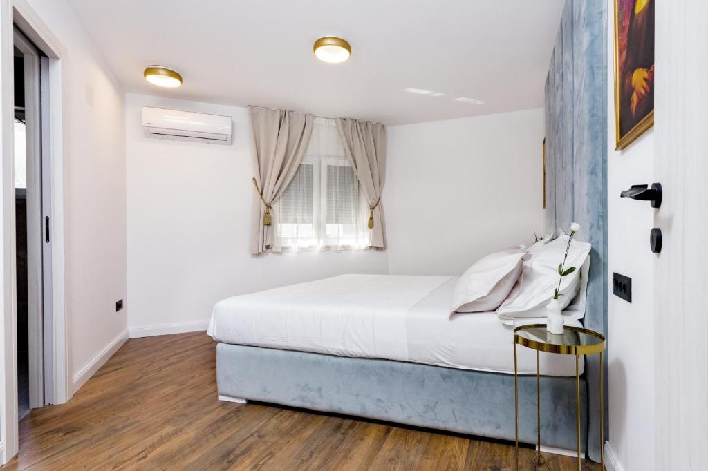 Posteľ alebo postele v izbe v ubytovaní Luxury Penthouse Duce