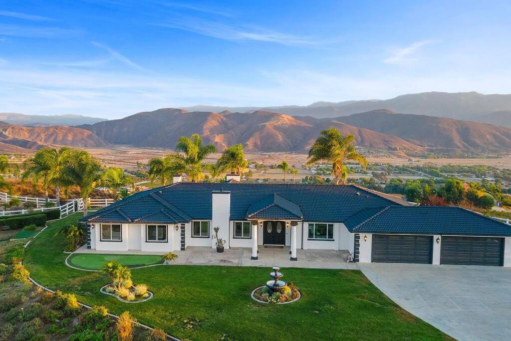 an aerial view of a house with mountains in the background at Grenache Estate - Nestled in Temecula Wine Country in Temecula