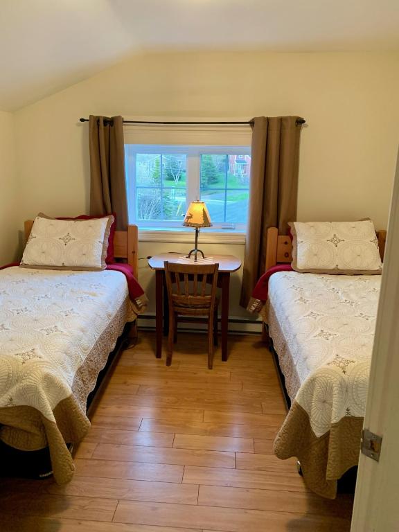 Postel nebo postele na pokoji v ubytování Crows Nest Inn