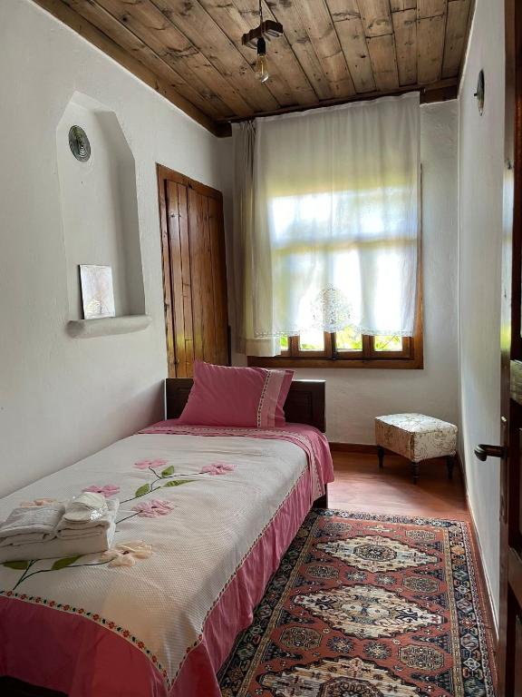 Postel nebo postele na pokoji v ubytování meltem hanım konağı