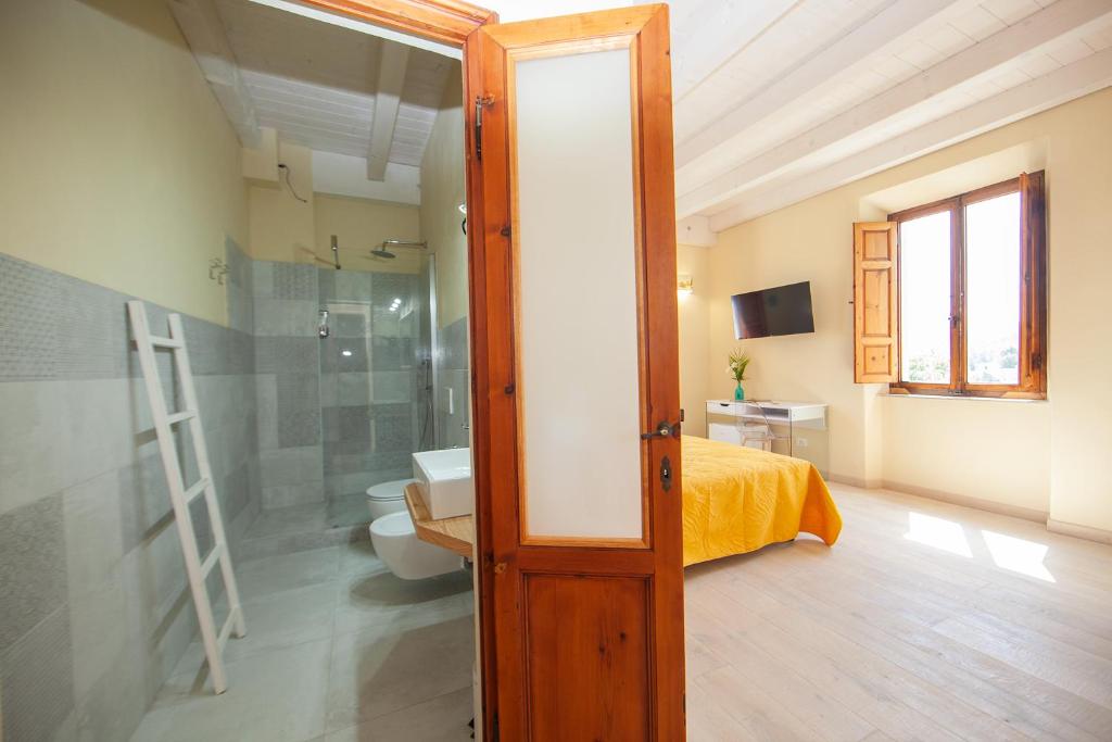 Un baño de Villa le Api