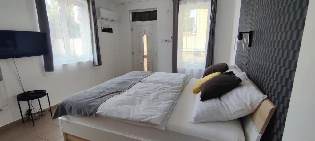 Postel nebo postele na pokoji v ubytování Nova Suites