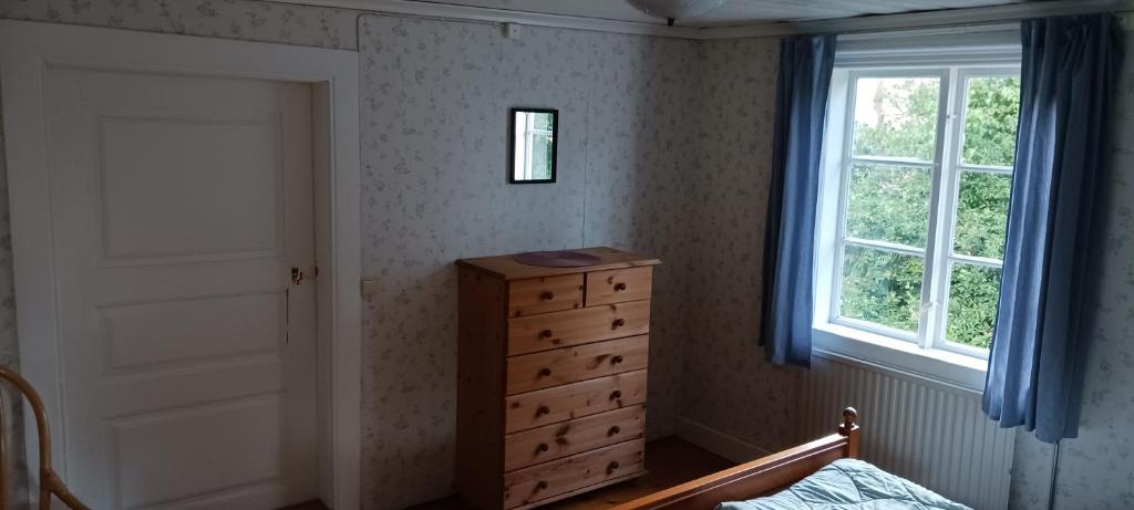 Postel nebo postele na pokoji v ubytování Månsarps skogs- och alpackagård