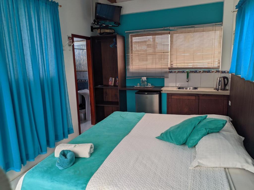 Postel nebo postele na pokoji v ubytování Sun Island