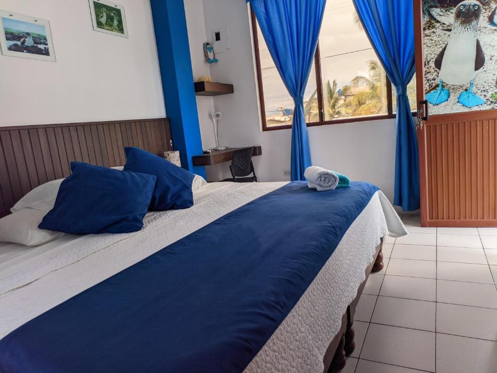 Postel nebo postele na pokoji v ubytování Sun Island