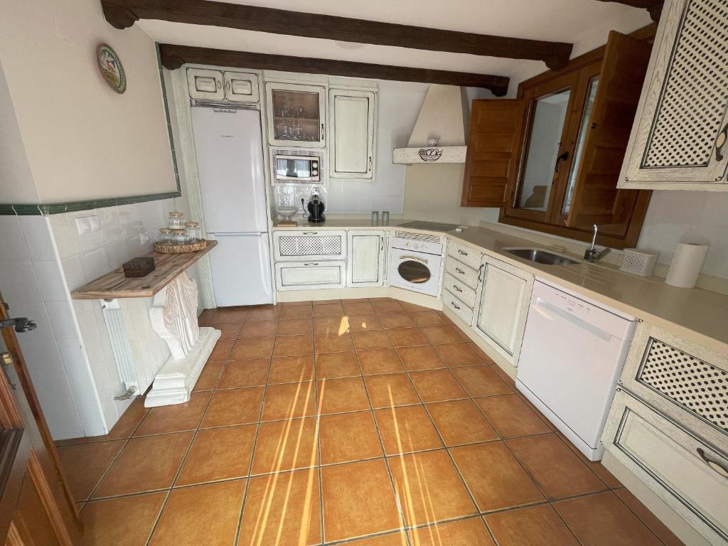 Kuchyň nebo kuchyňský kout v ubytování Paraíso Villa Parchís