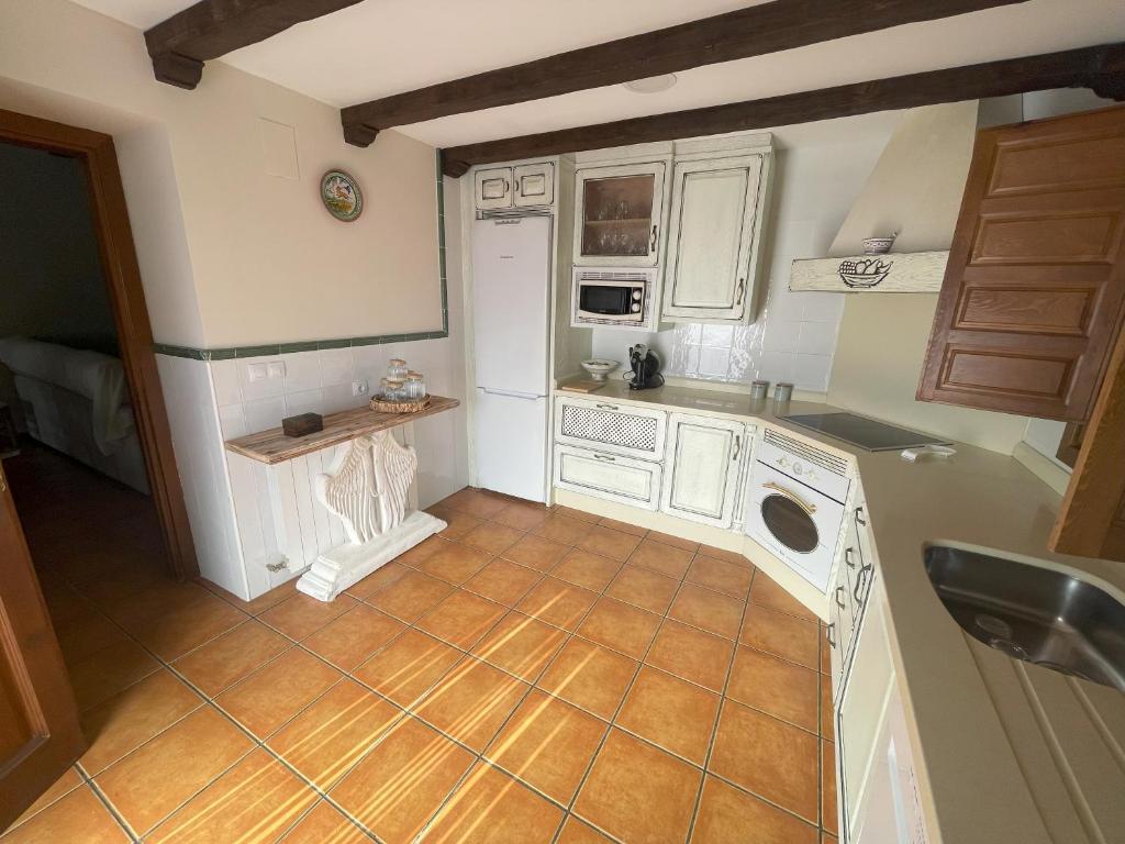 Kuchyň nebo kuchyňský kout v ubytování Paraíso Villa Parchís