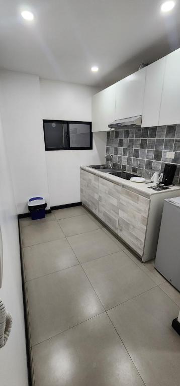 Kuchyň nebo kuchyňský kout v ubytování Apart Hotel Osaka 4 Personas