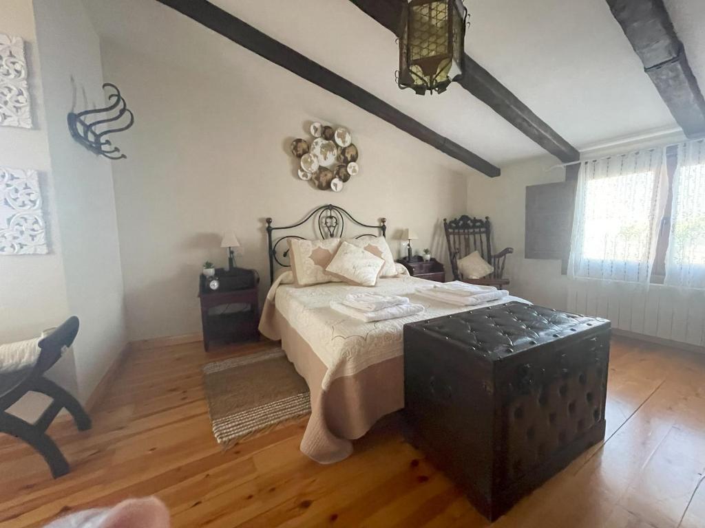 Postel nebo postele na pokoji v ubytování Paraíso Villa Parchís