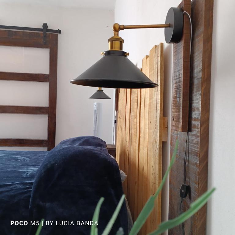Postel nebo postele na pokoji v ubytování Espacio rústico