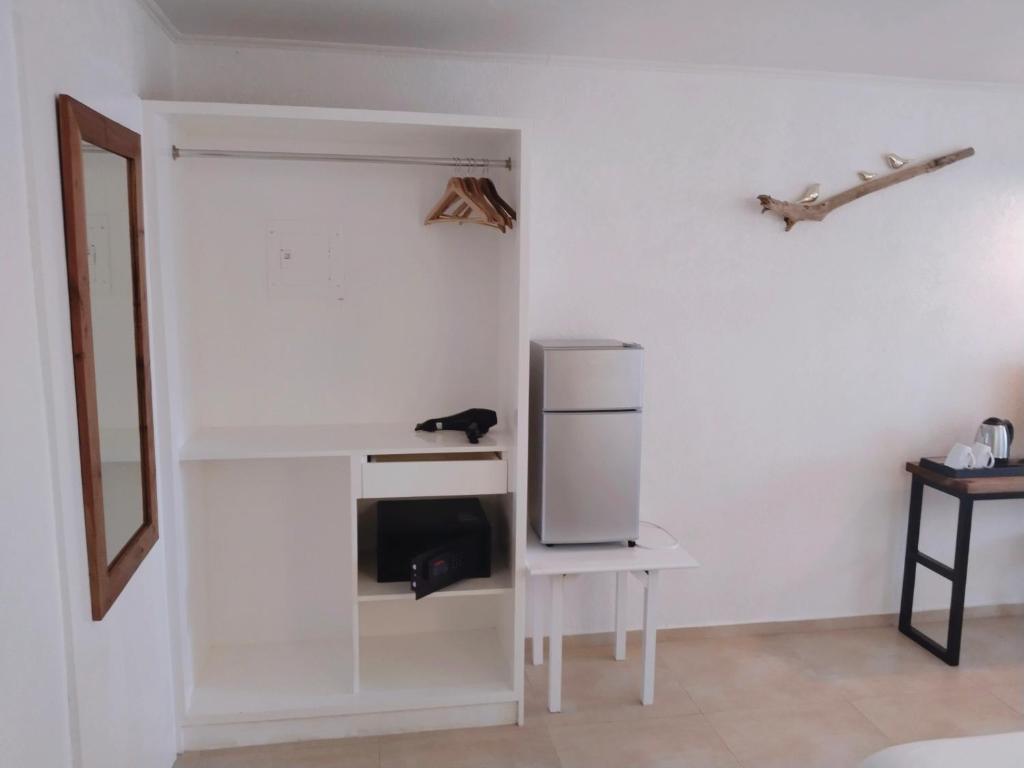 Kuchyň nebo kuchyňský kout v ubytování Alona Garden Suites