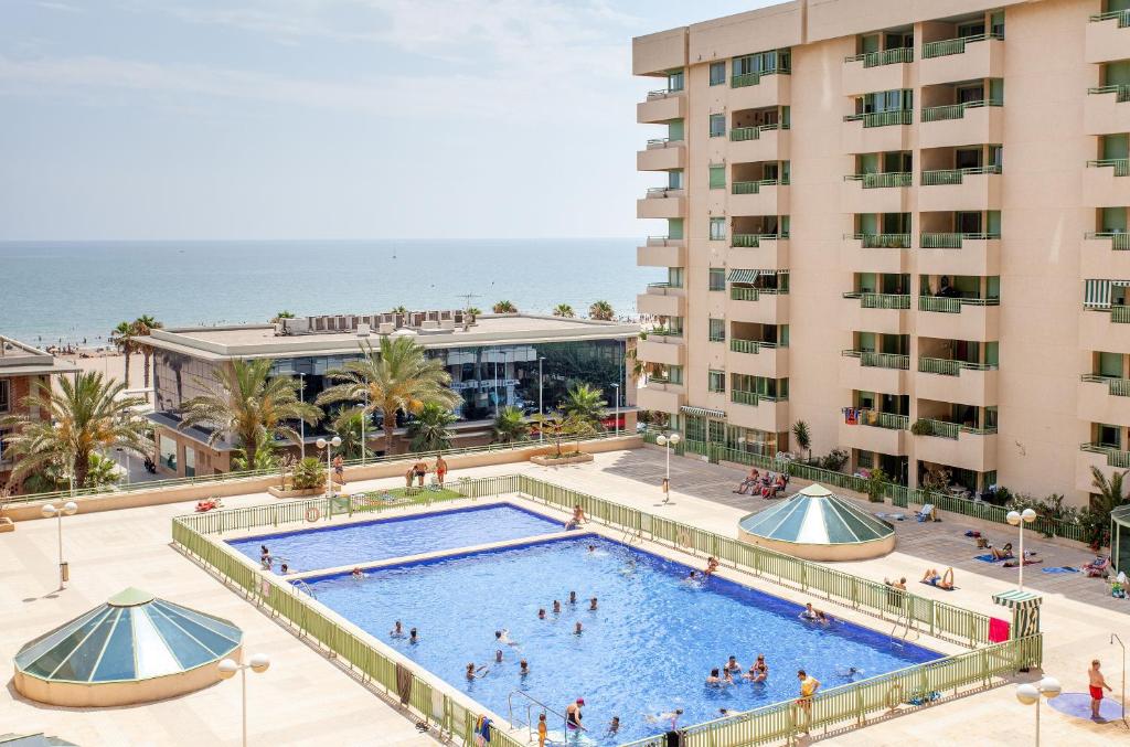 an aerial view of the pool at the hotel at Apartment Patacona Beach 6 in Valencia