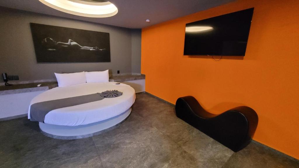 TV a/nebo společenská místnost v ubytování 4Play Motel