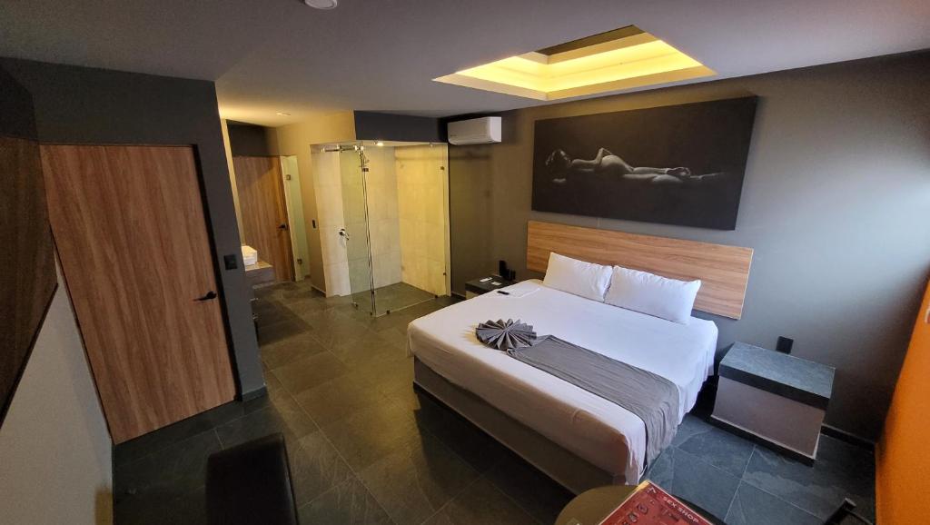 Postel nebo postele na pokoji v ubytování 4Play Motel