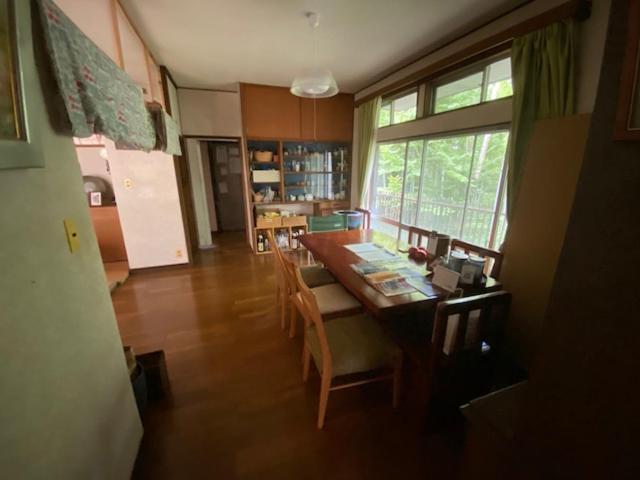 Kuchyň nebo kuchyňský kout v ubytování Guesthouse Oomiya base 大宮基地別荘