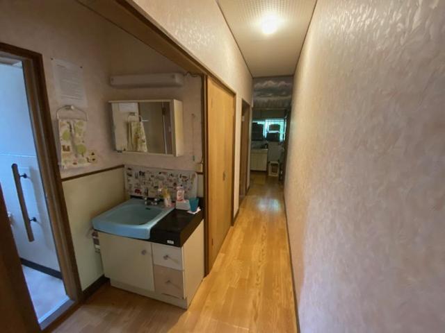 Postel nebo postele na pokoji v ubytování Guesthouse Oomiya base 大宮基地別荘