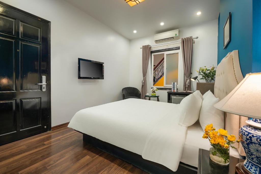 TV a/nebo společenská místnost v ubytování Hanoi Starlight Boutique Hotel