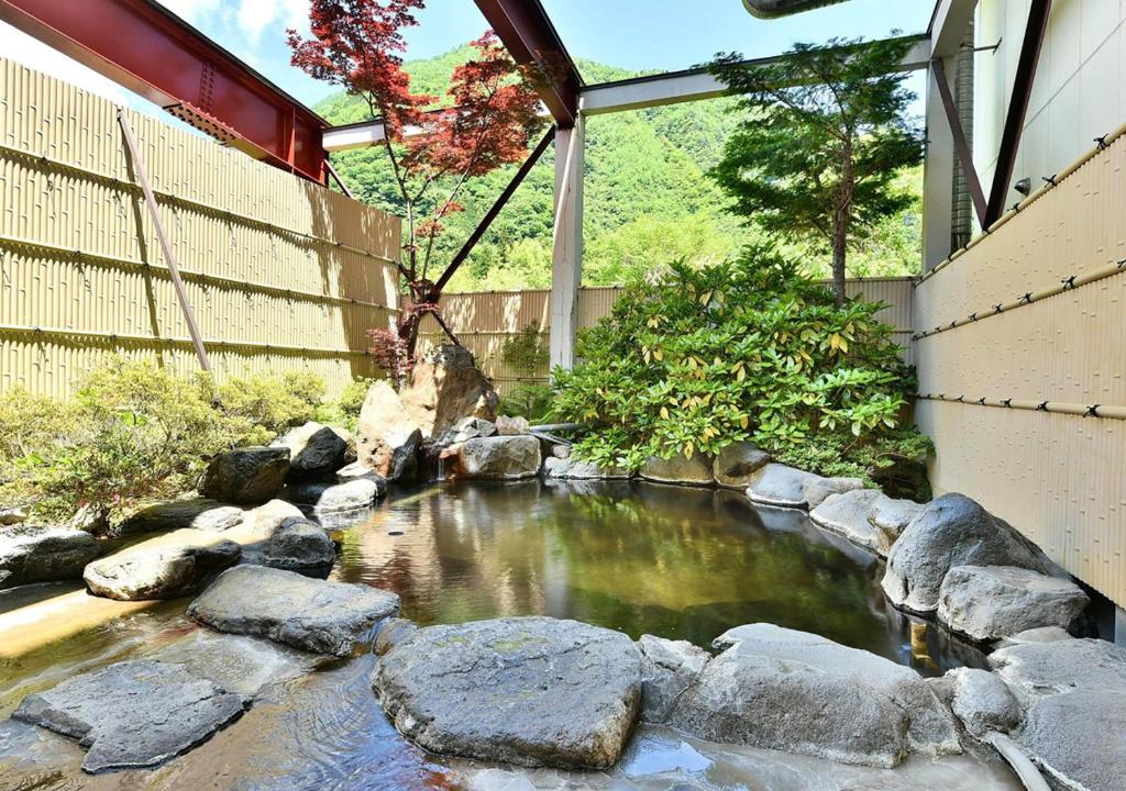 Zahrada ubytování 筋肉と自然と遊ぶ宿 田島館