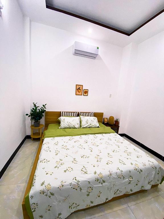 Postel nebo postele na pokoji v ubytování Homestay Green Quy Nhơn