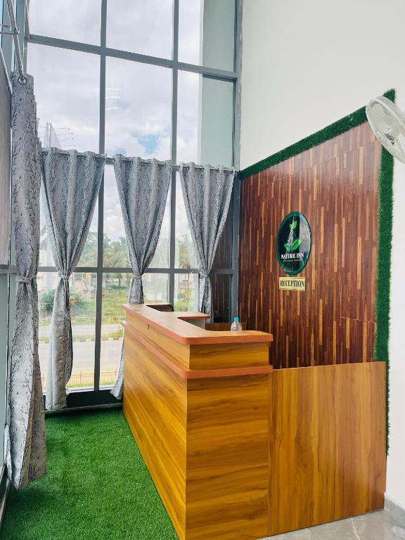 Fotografie z fotogalerie ubytování Nature Inn With Greenery Comforts v destinaci Devanhalli