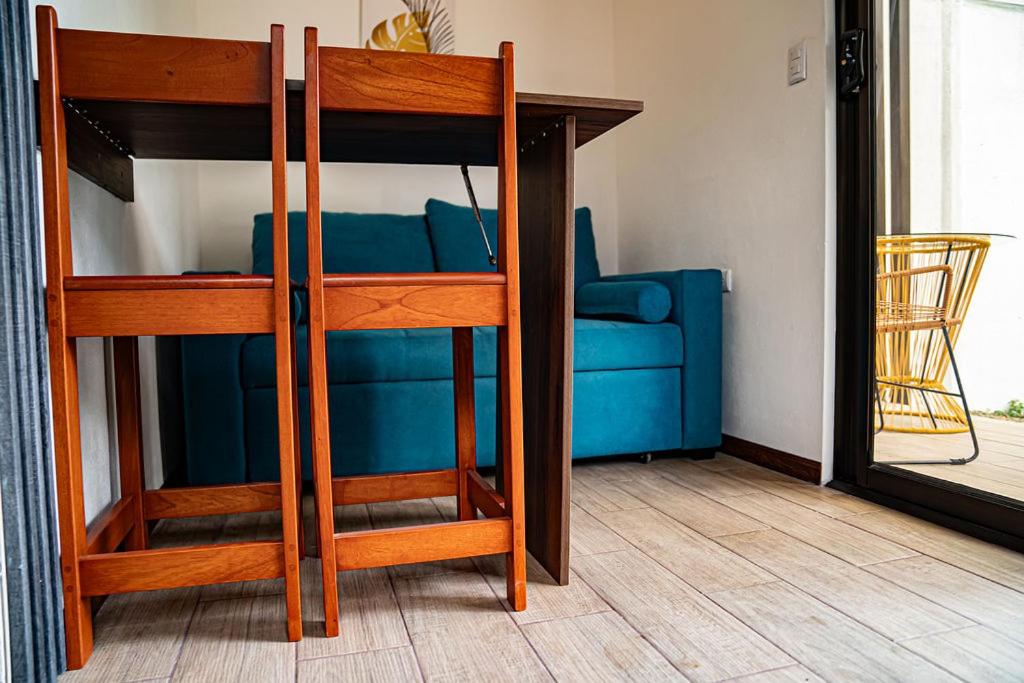 Postel nebo postele na pokoji v ubytování Villas y Casa Dìwö - Puerto Viejo