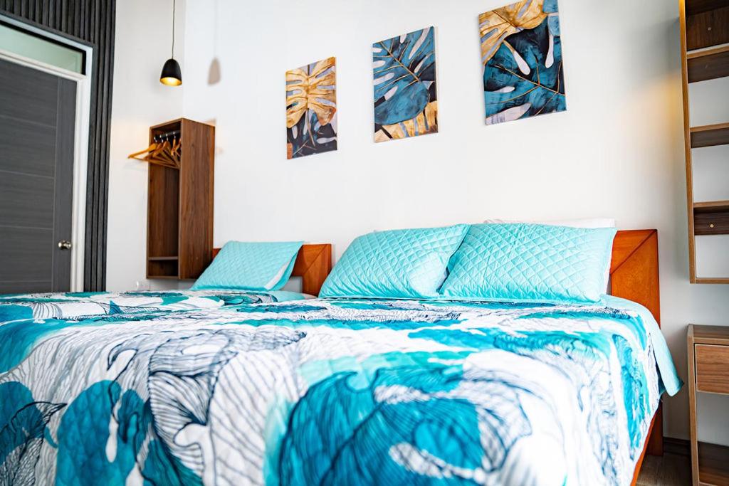Postel nebo postele na pokoji v ubytování Villas y Casa Dìwö - Puerto Viejo