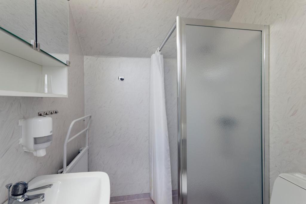 Koupelna v ubytování Wisingsö Hotell
