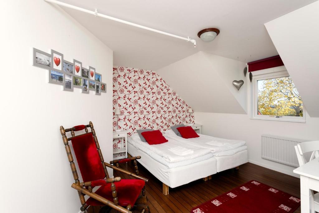 Postel nebo postele na pokoji v ubytování Wisingsö Hotell