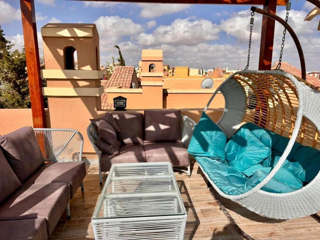 A seating area at Fancy sea view villa with private jacuzzi mountain view north coast Bait Karim - Twin Villa with roof & juccuzi