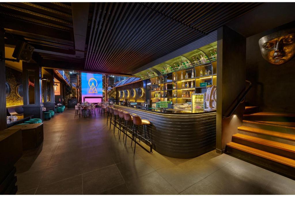 Lounge nebo bar v ubytování Aston Inn Batu