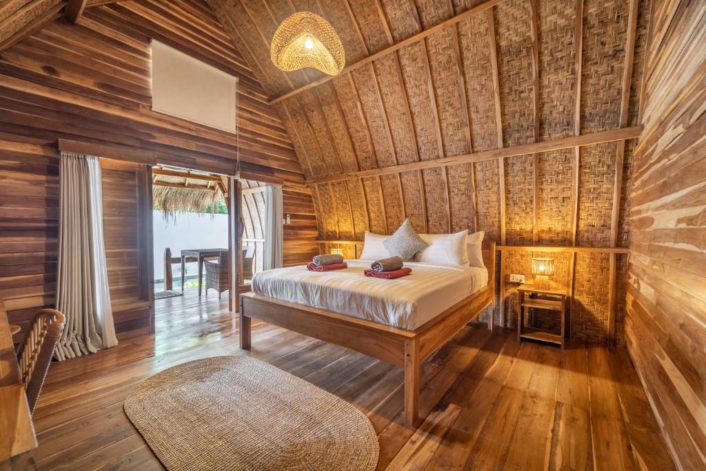 Postel nebo postele na pokoji v ubytování My Island Home Gili Air