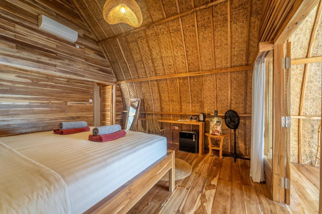 Postel nebo postele na pokoji v ubytování My Island Home Gili Air