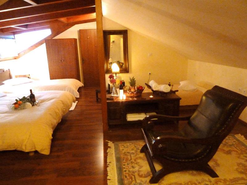 Postel nebo postele na pokoji v ubytování Mysaion Hotel